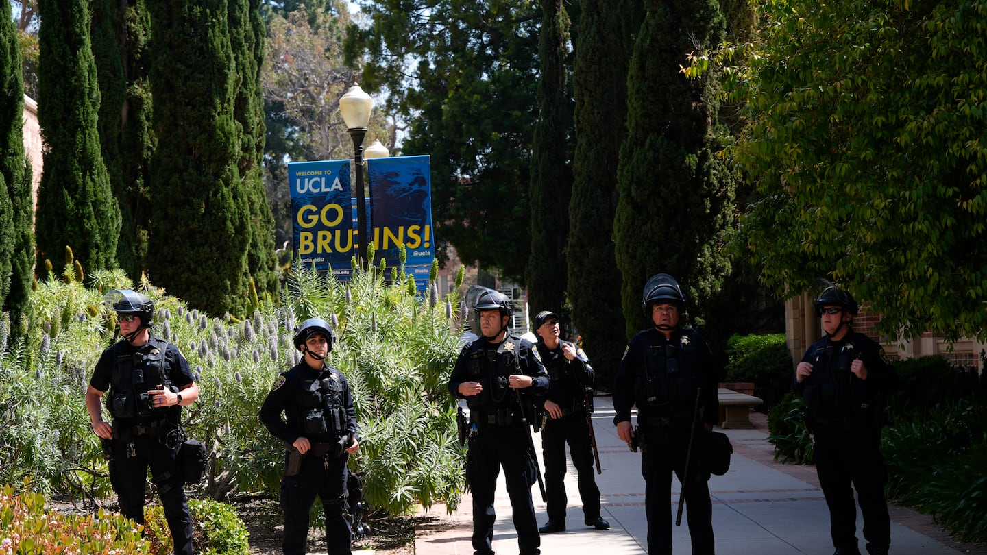 Police stage on the UCLA campus after nighttime clashes between pro-Israel and pro-Palestinian groups, May 1, in Los Angeles.