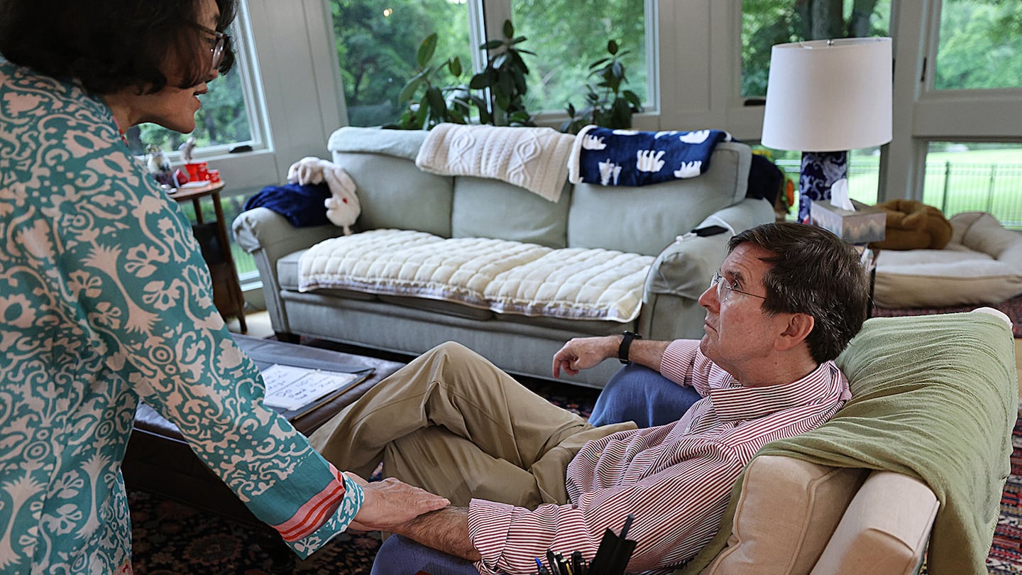 At their home in Sherborn, Kay Kim asked her husband, Tony Downs, if he had eaten lunch yet on a day this spring. He has early-onset Alzheimer's disease.