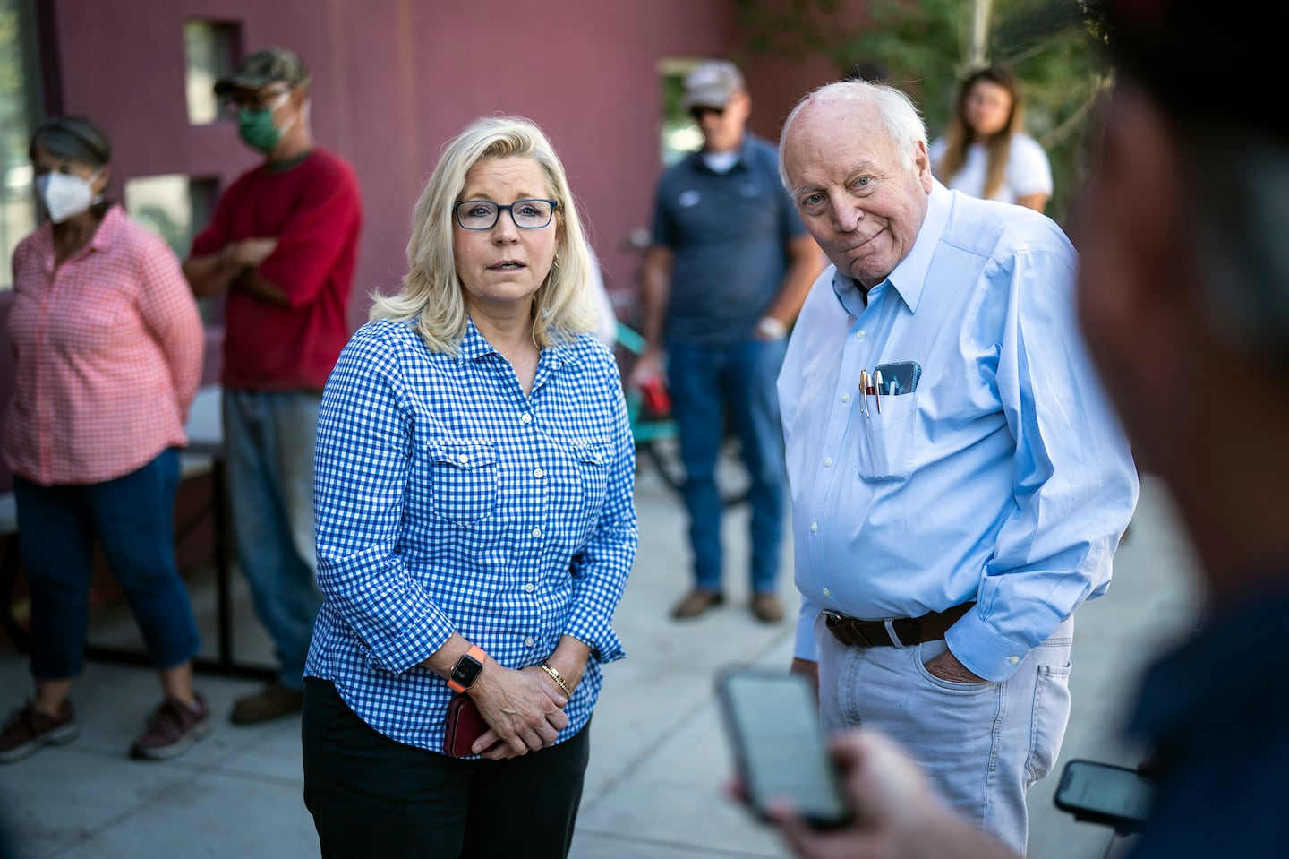 Then-Representative Liz Cheney and her father, former vice president Dick Cheney, arrived to vote Jackson Hole, Wyo., in the Republican primary election on Aug. 16, 2022. They are part of a growing list of Republican former elected and administration officials who have publicly said they will vote for Democrat Kamala Harris for president.