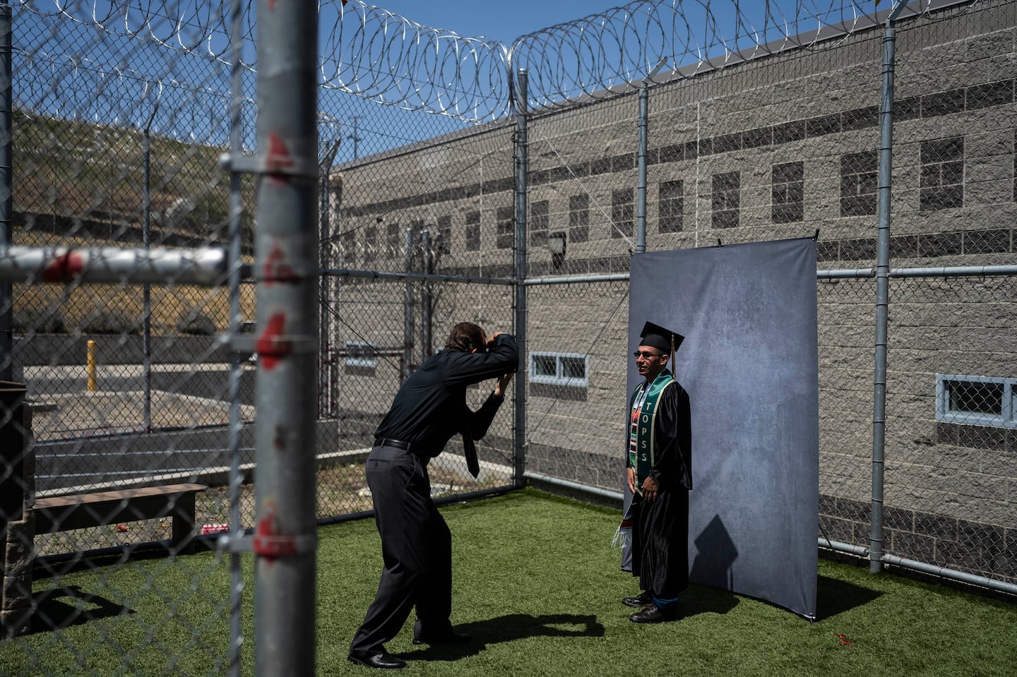 Incarcerated graduate Jose Catalan posed for photos after his graduation ceremony at Folsom State Prison in Folsom, Calif., on, May 25, 2023. Catalan earned his bachelor's degree in communications through the Transforming Outcomes Project at Sacramento State.