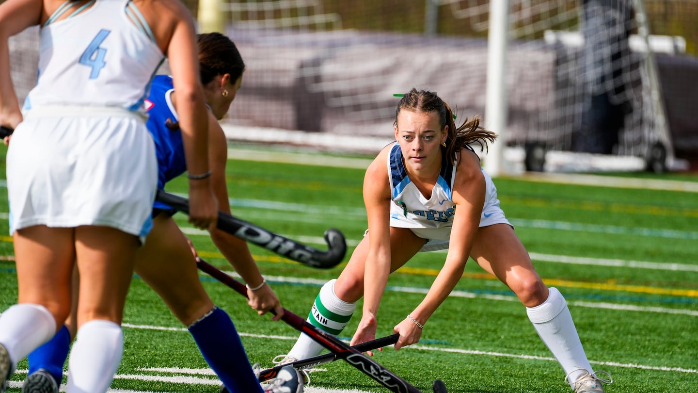 Medfield senior Adeline Keaveney (6), focused on denying an Ashland attack in Monday's match, teams up with fellow captains Maeve Kelly and Emily Fratolillo to form an impressive defensive backline.