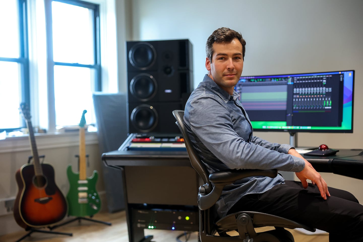 Mikey Shulman, cofounder of Suno, in his company’s Cambridge office.