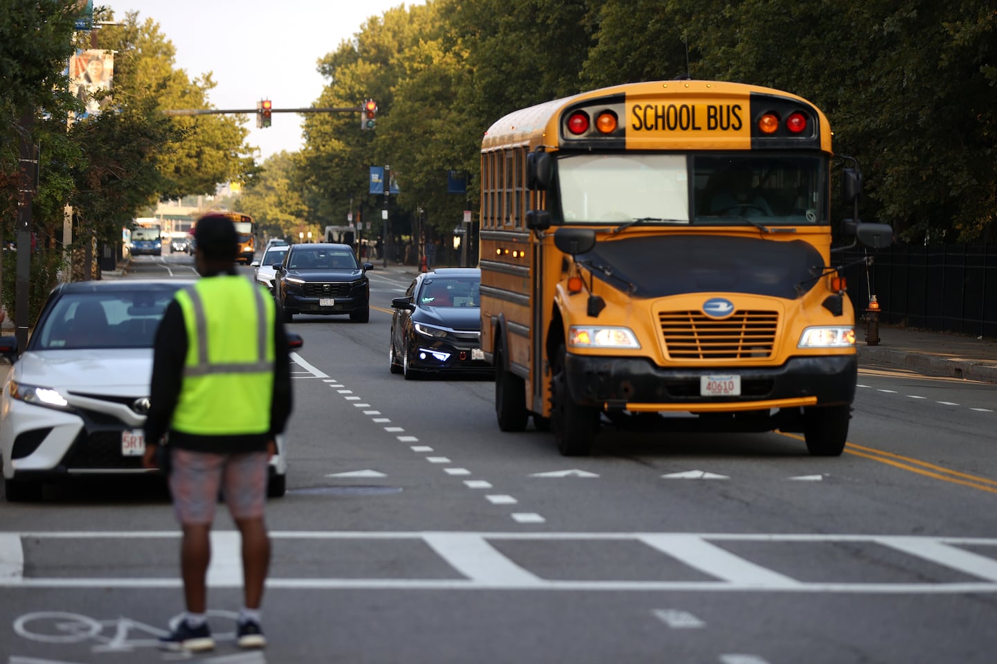 Boston City Councilors Ed Flynn and Erin Murphy testified at the state education agency’s headquarters about the district’s ongoing busing problems.