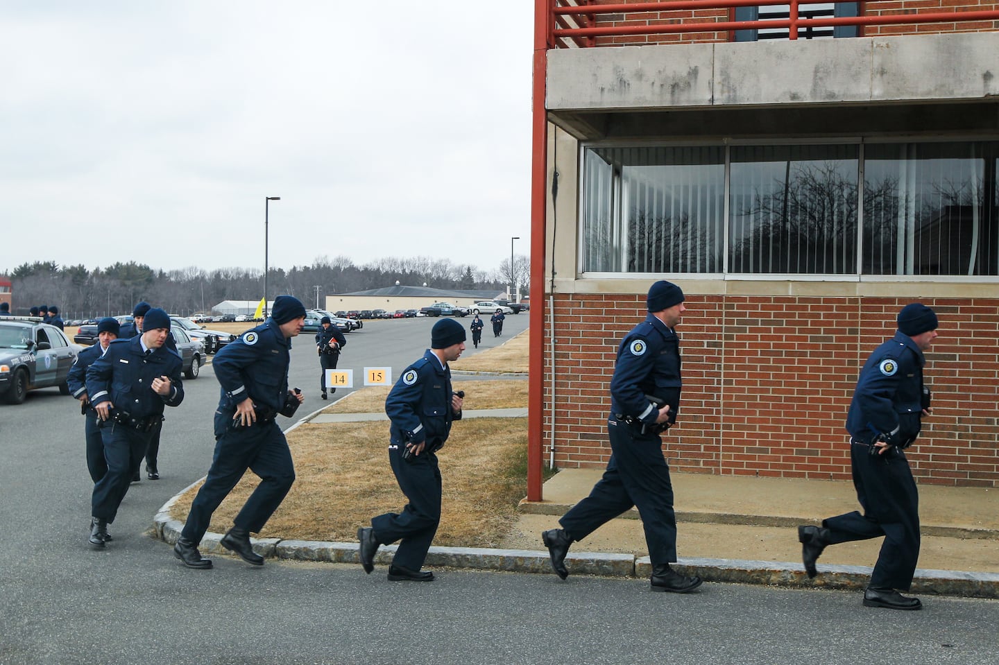 State Police trainees turned the corner of a building at the Massachusetts State Police complex in New Braintree in 2012.