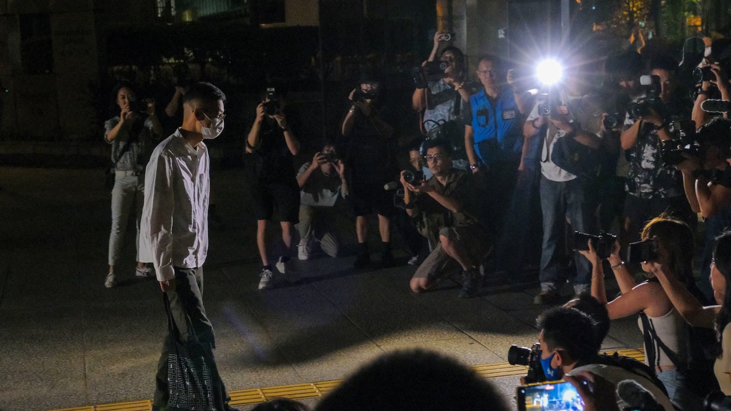 Patrick Lam, former chief editor of Stand News, left court Thursday after receiving a sentence reduction for a sedition conviction in Hong Kong.