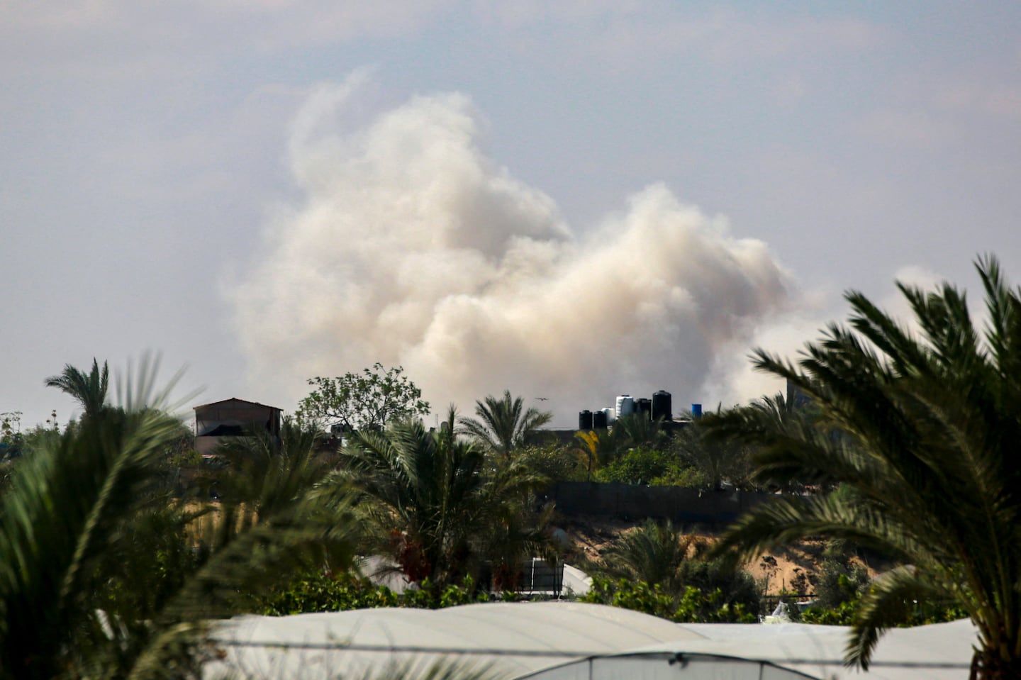 Smoke billows over an area targeted during Israeli bombardment in Rafah, in the southern Gaza Strip, on Sept. 26.