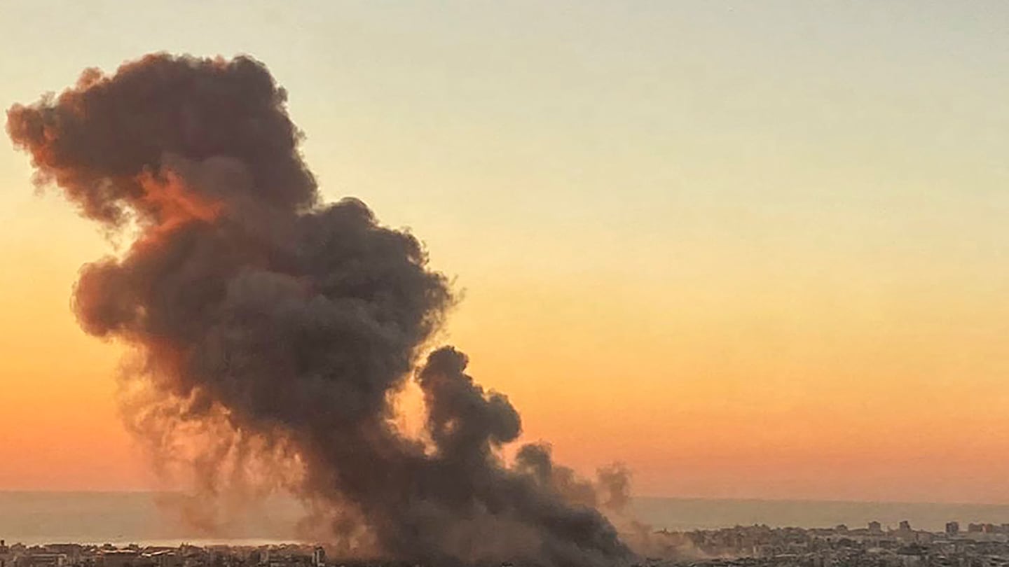 Smoke rises above Beirut's southern suburbs during an Israeli strike on September 27, 2024. Israeli bombing of Iran-backed Hezbollah strongholds around Lebanon has killed hundreds of people this week, while the militant group has retaliated with rocket barrages.