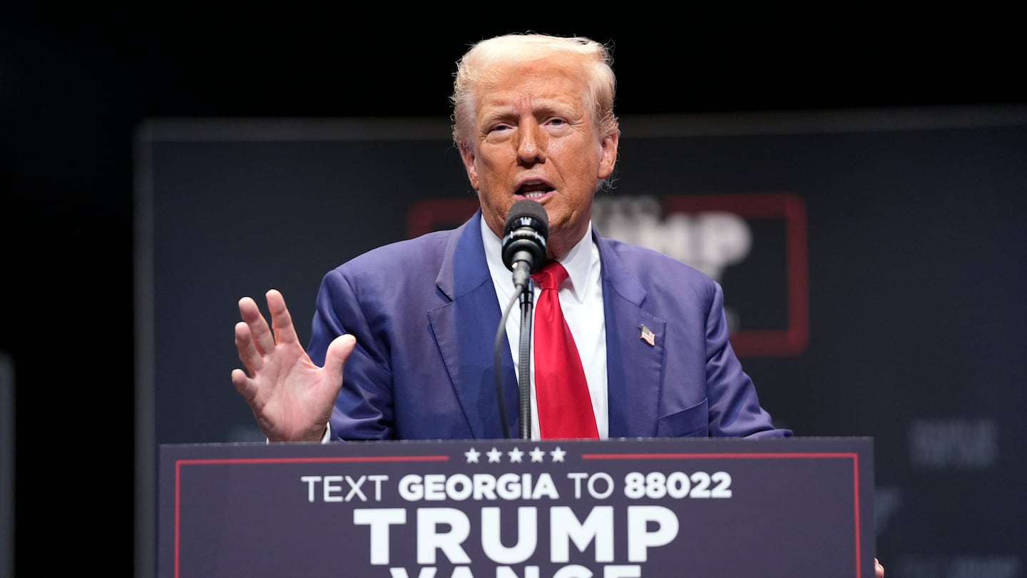 Former president Donald Trump speaks about the tax code and manufacturing at the Johnny Mercer Theatre Civic Center, Tuesday, in Savannah, Ga.