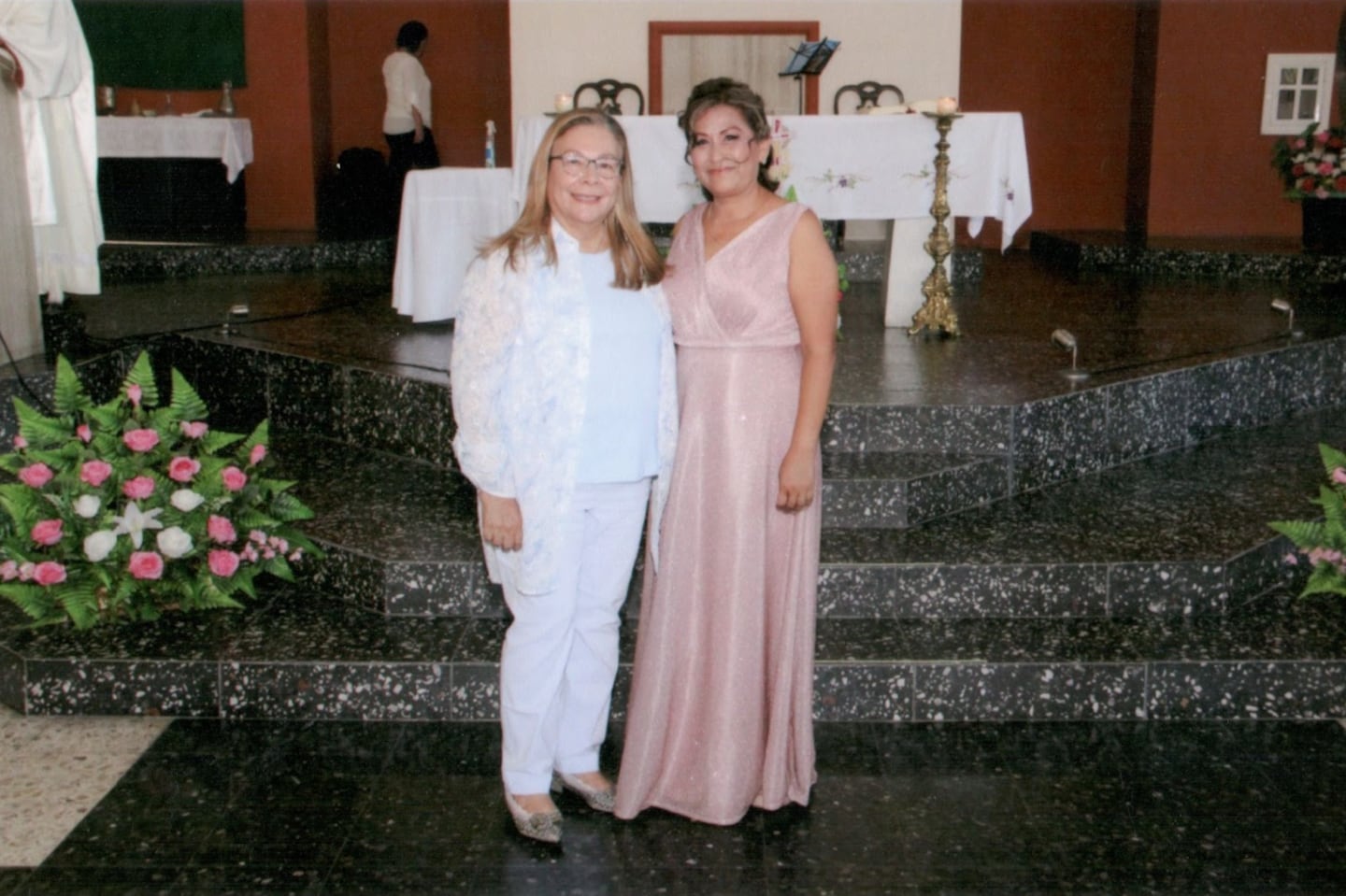 My mom and Dioni at Dioni’s cincuentañera Mass celebration.