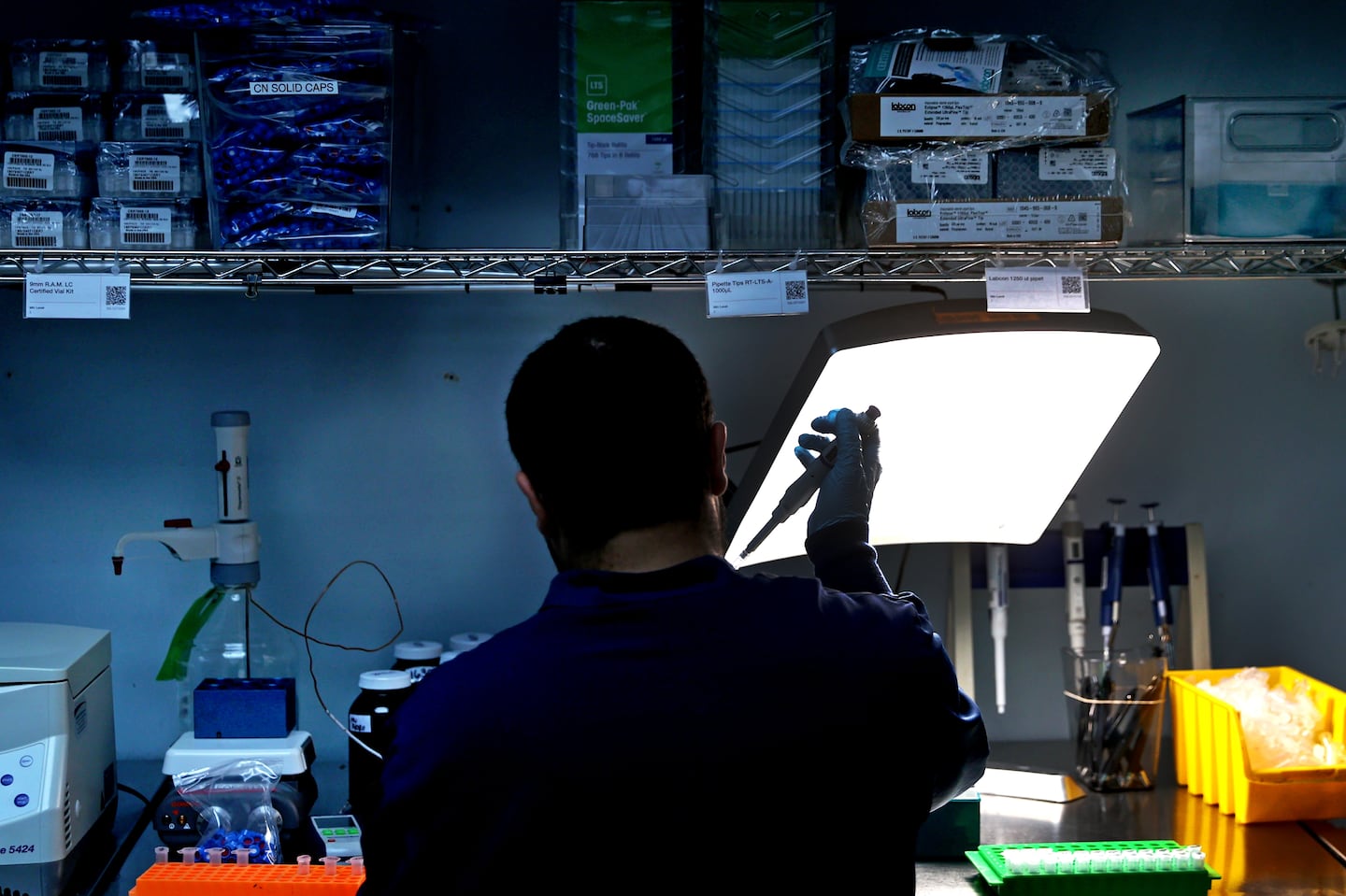 Amjad Ismail, a lab technician at MCR Labs in Framingham, processed samples recently. MCR's founder, Michael Kahn, says the state's flawed testing system penalizes labs like his that are honest brokers and rewards those that produce the results cannabis companies want.