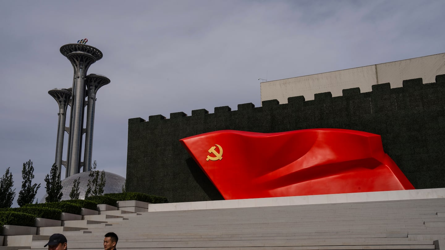 Visitors passed the Chinese Communist Party flag at the museum of the Communist Party of China in Beijing last year.