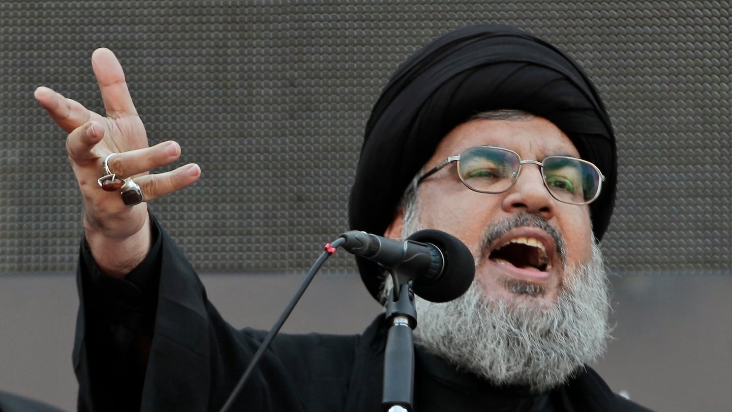 Hassan Nasrallah, speaking to a crowd in a rare public appearance in the suburbs of Beirut in 2013.