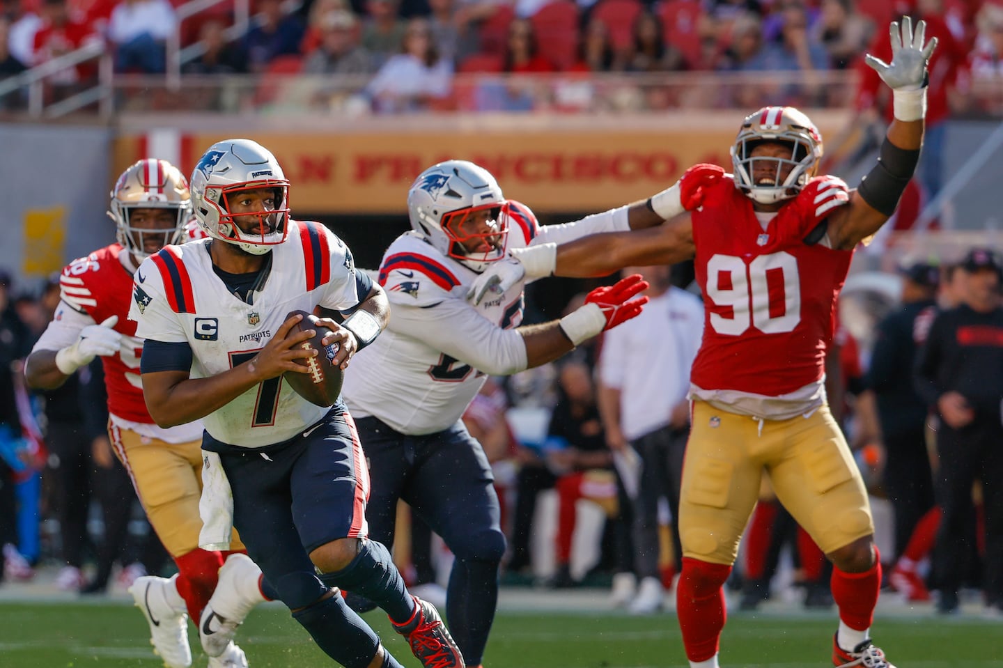 Pressure from the 49ers had Patriots quarterback Jacoby Brissett scrambling.