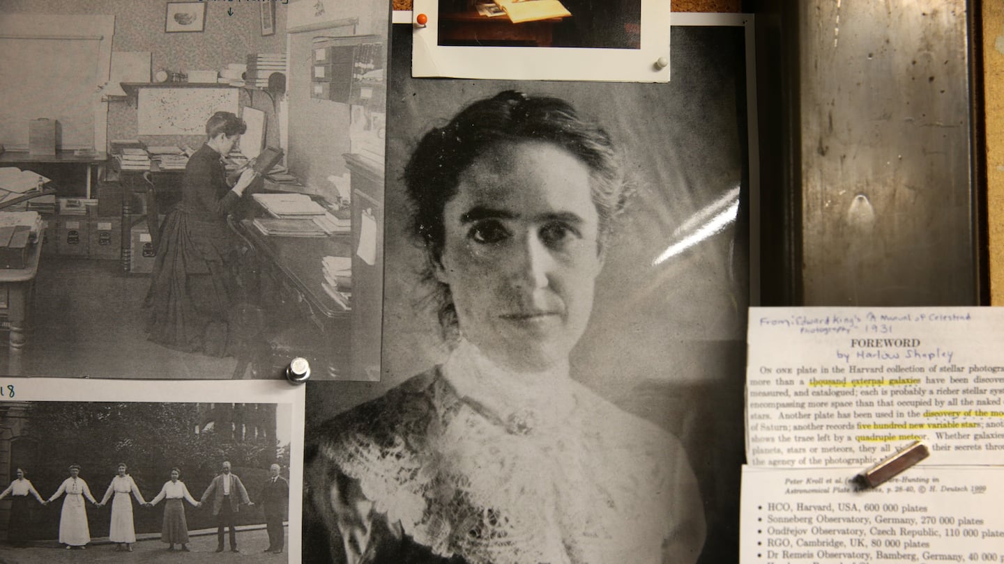 Henrietta Leavitt, center, in the Plate Stacks office at the Harvard Smithsonian Center for Astrophysics in Cambridge.