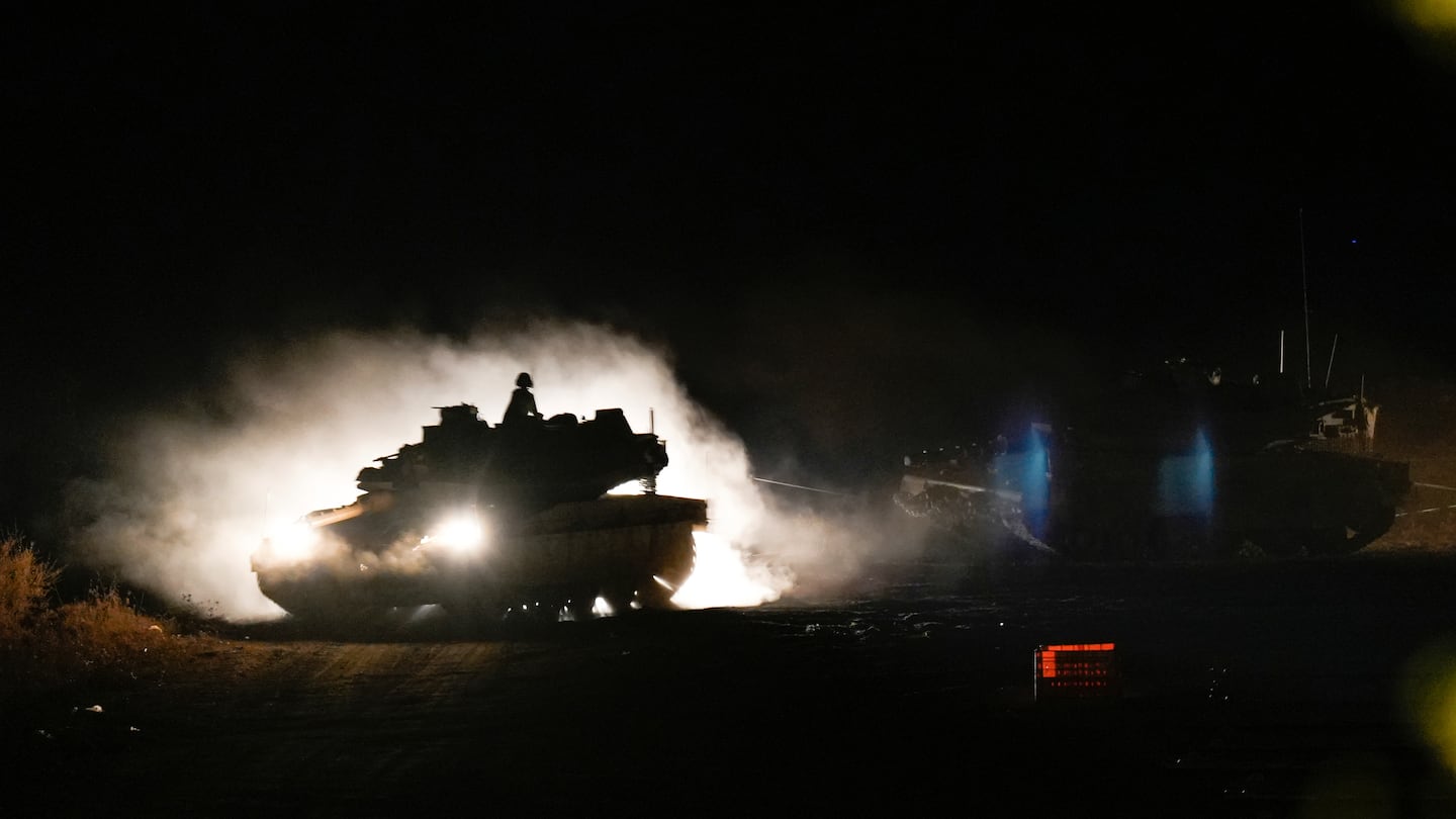 An Israeli tank manoeuvres in northern Israel near the Israel-Lebanon border, on Sept. 30.