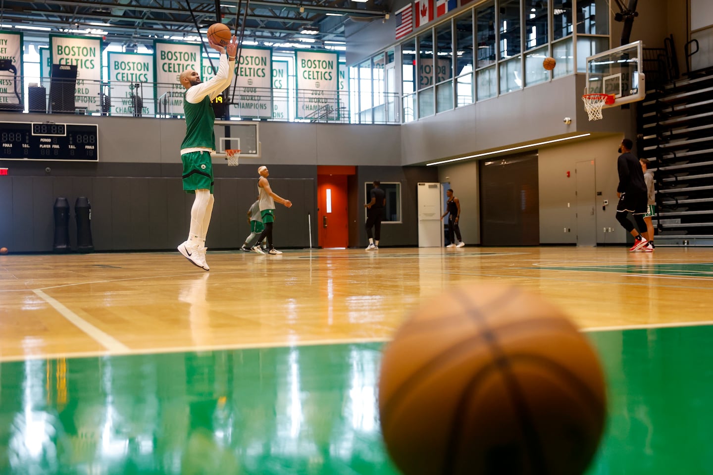 Boston Celtics guard Derrick White shot a 3-pointer during the first day of training camp at the Auerbach Center on Sept. 25.