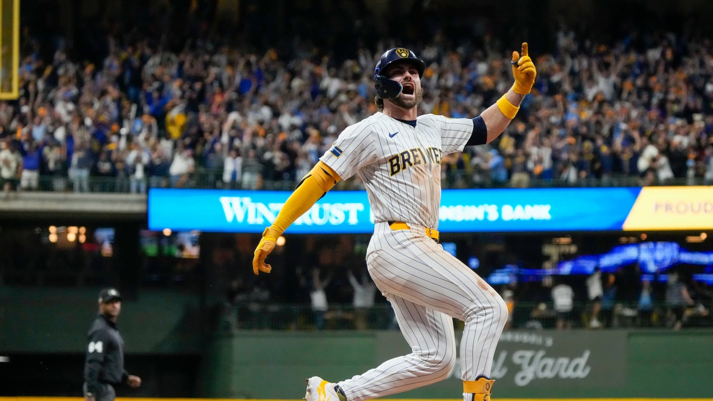 Milwaukee's Garrett Mitchell celebrates after blasting his clutch two-run, go-ahead home run in the eighth inning as the Brewers rallied to win Game 2 Wednesday over the Mets in their National League wild card series.