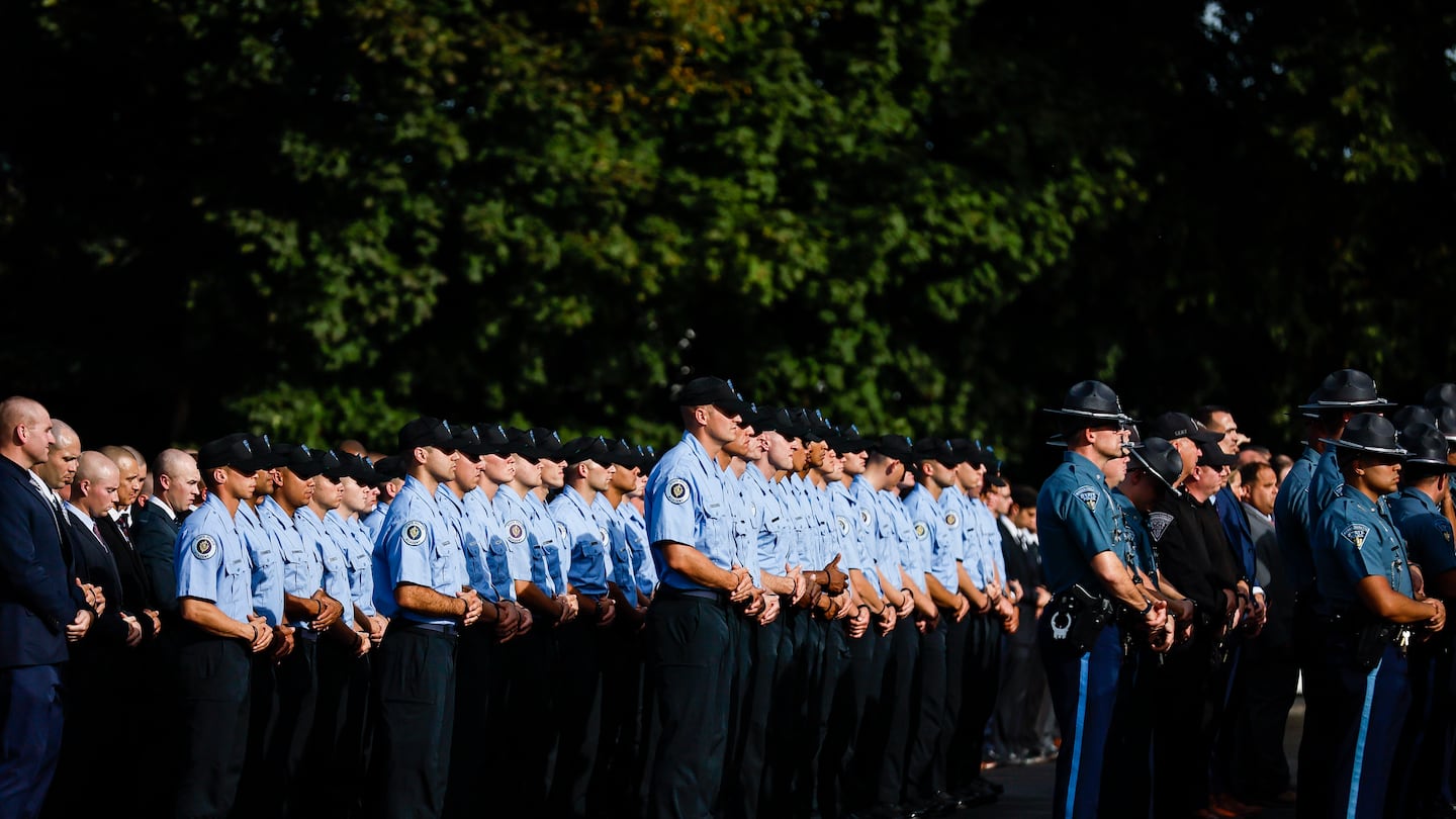 Massachusetts State Police Command Staff and over 180 recruits from the 90th Recruit Training Troop stood in formation outside Mercadante Funeral Home & Chapel in Worcester. The officers provide a uniformed presence during visiting hours for Trooper Enrique Delgado-Garcia, 25. Delgado-Garcia was injured during a defensive tactics training exercise.