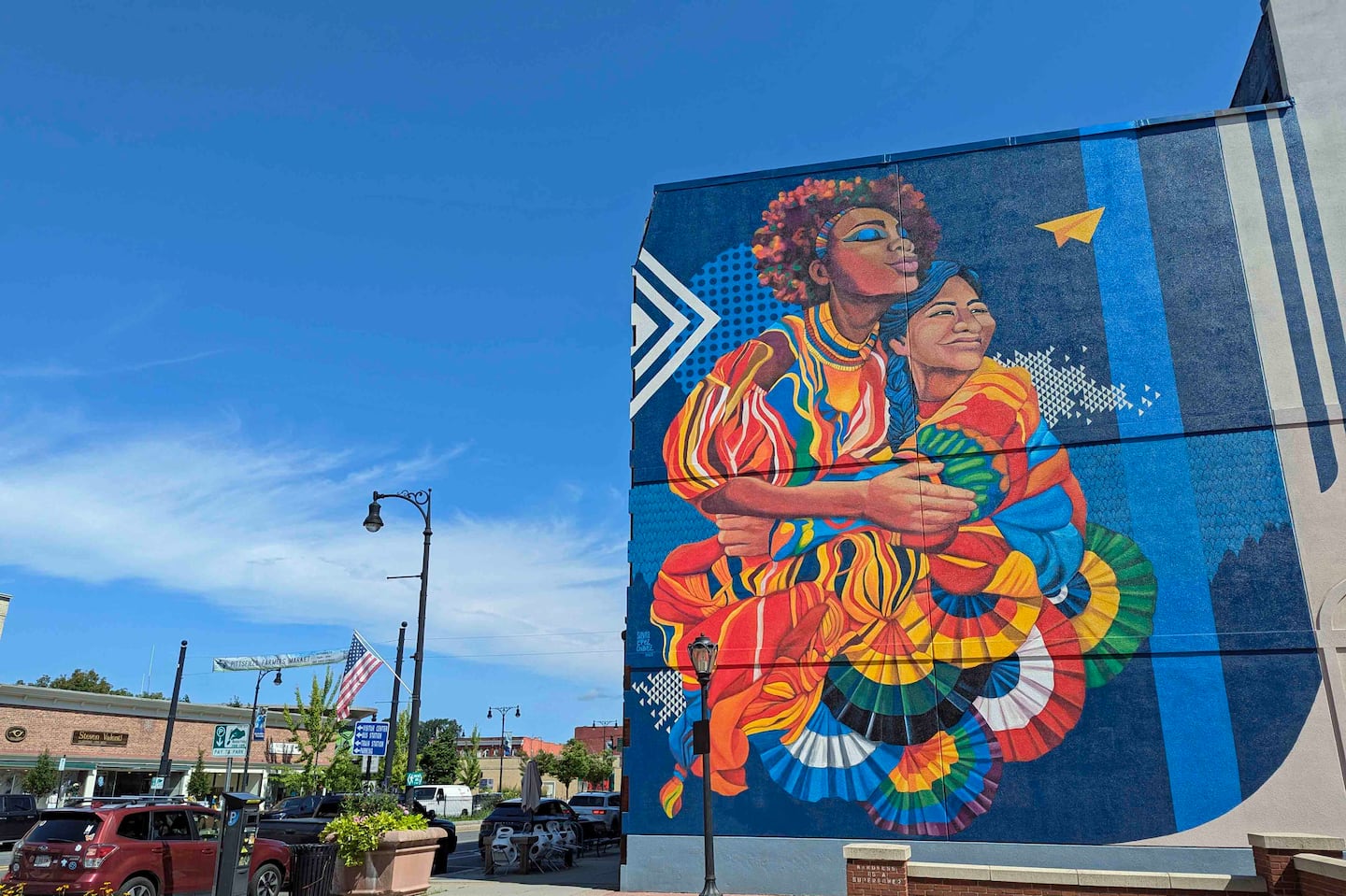 ‶Sisterhood″ by Silvia López Chavez overlooks a small downtown park in Pittsfield. 