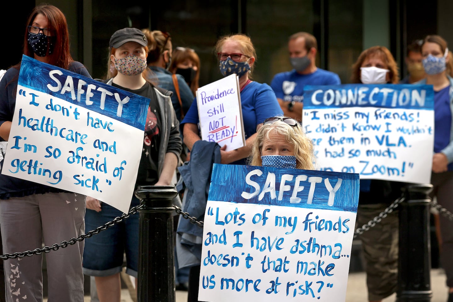 In Sptember 2020, members of the Providence Teachers Union rally to oppose school reopening outside of the Rhode Island Department of Education.