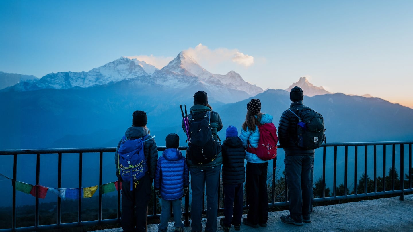 In this scene from "Blink," Leo, Laurent, Édith, Colin, Mia, and Sébastien look out at the mountains in the Annapurna range.