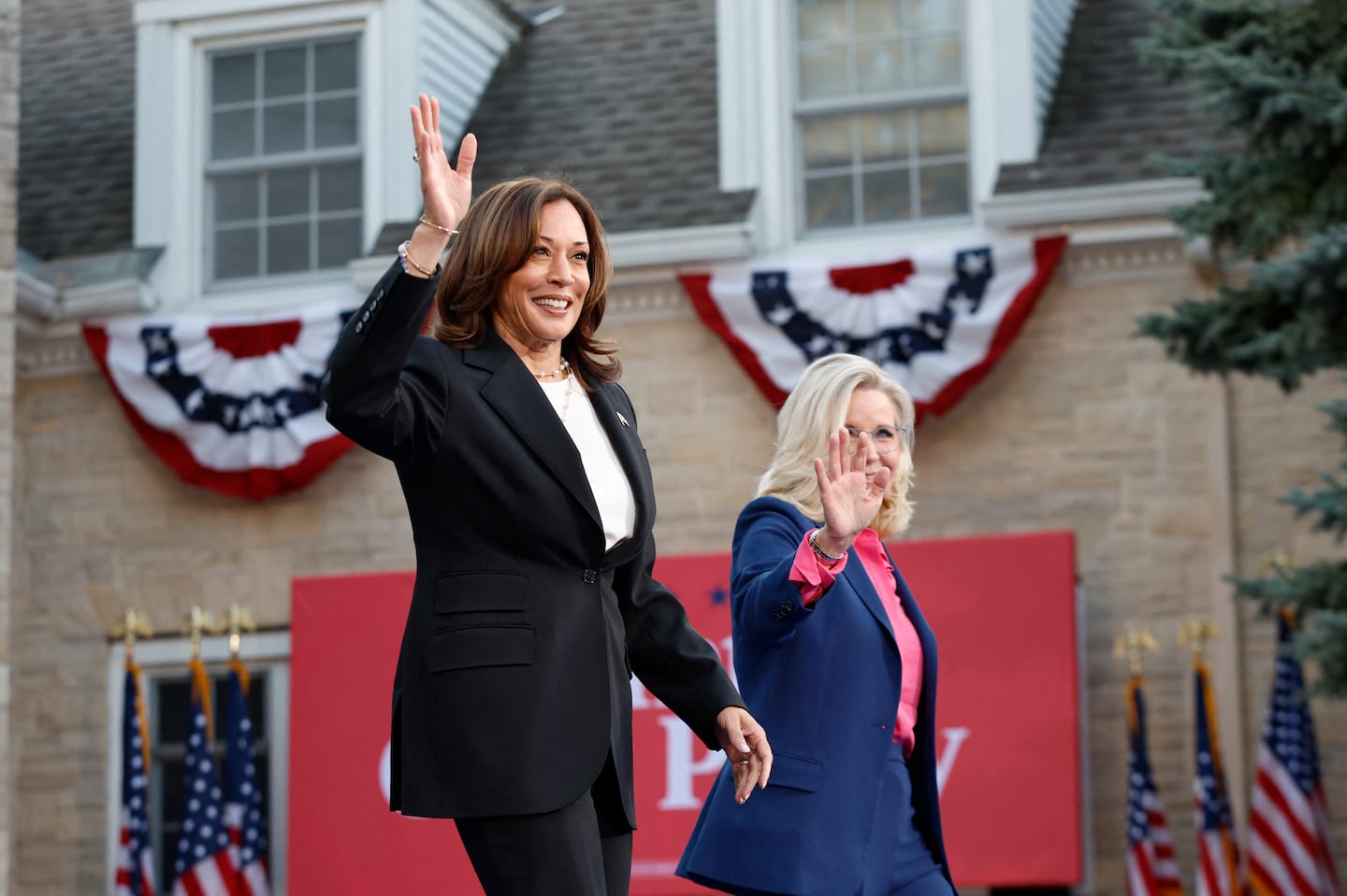 Vice President Kamala Harris and former US representative Liz Cheney arrive for a campaign event at Ripon College in Wisconsin, on Oct. 3.