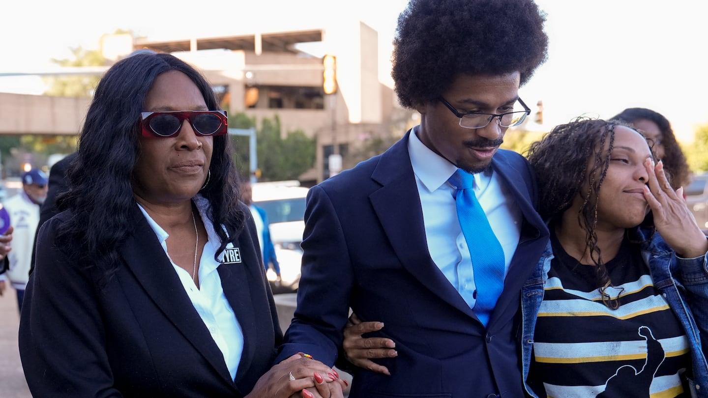 RowVaughn Wells, left, mother of Tyre Nichols, prayed with Representative Justin J. Pearson, D-Memphis, center, entered the federal courthouse for the trial of three former Memphis police officers charged in the 2023 fatal beating of her son on Wednesday in Memphis, Tenn.