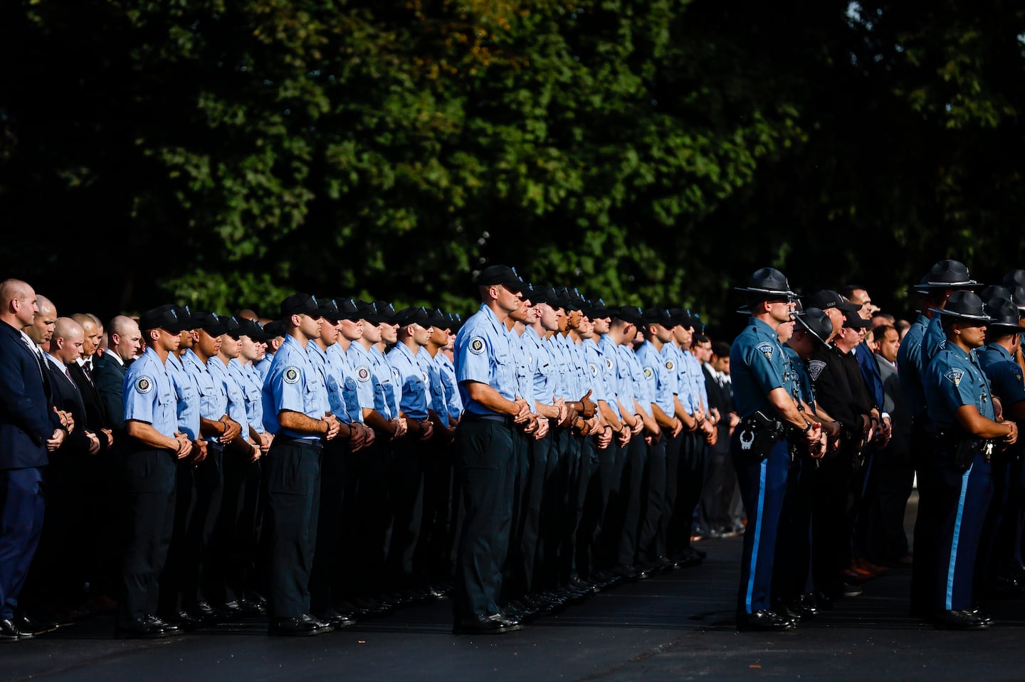 Massachusetts State Police Command Staff and over 180 recruits from the 90th Recruit Training Troop stood in formation outside Mercadante Funeral Home & Chapel in Worcester. The officers provide a uniformed presence during visiting hours for Trooper Enrique Delgado-Garcia, 25. Delgado-Garcia was injured during a defensive tactics training exercise.