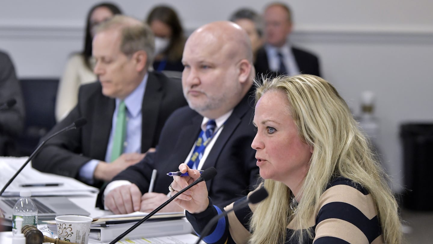 State Board of Elementary and Secondary Education Chair Katherine Craven (right)