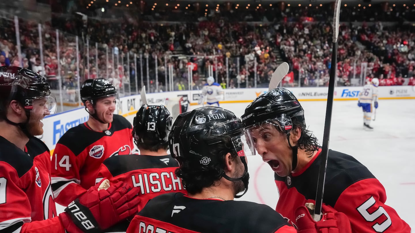 Nobody was happier to have the NHL back than the Devils' Brenden Dillon (right).