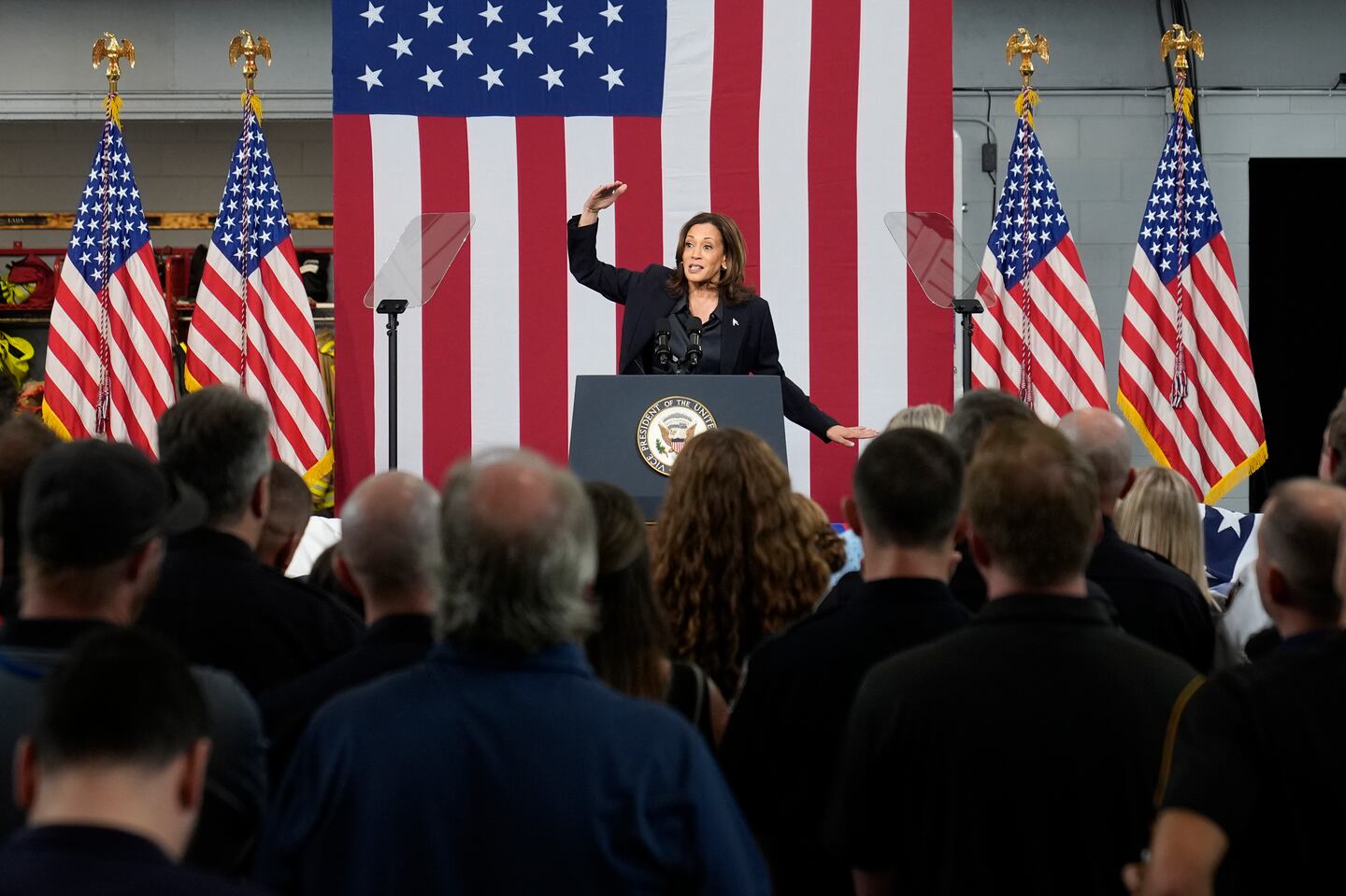 Democratic presidential nominee Vice President Kamala Harris speaks at the Redford Township Fire Department North Station, Friday, Oct. 4, 2024, in Redford Township, Mich. (AP Photo/Paul Sancya)