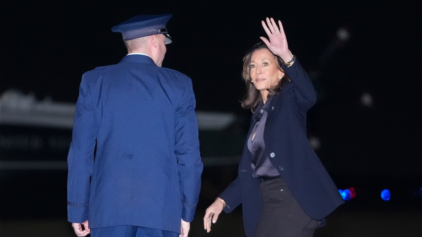 Democratic presidential nominee Vice President Kamala Harris waves after arriving on Air Force Two at Joint Base Andrews, Md., on Oct. 4.