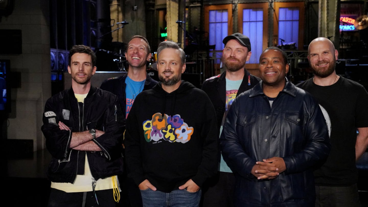 From left: Musical guest Coldplay, host Nate Bargatze, and Kenan Thompson during Promos in Studio 8H on Thursday.