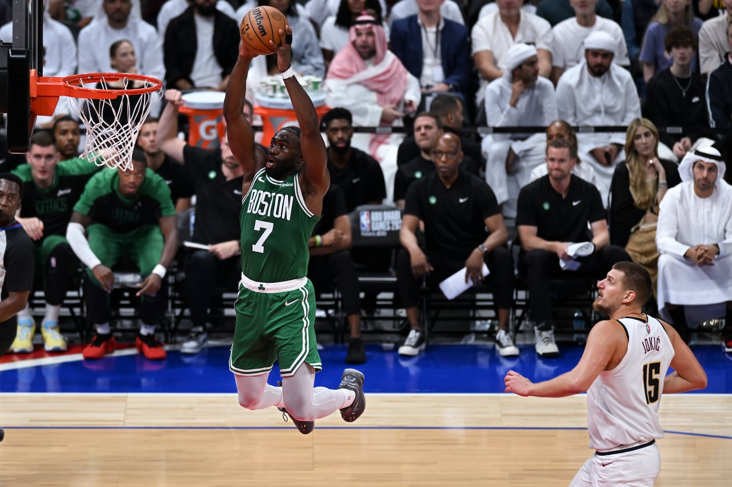 Jaylen Brown dunks during a preseason game in Abu Dhabi on Sunday.