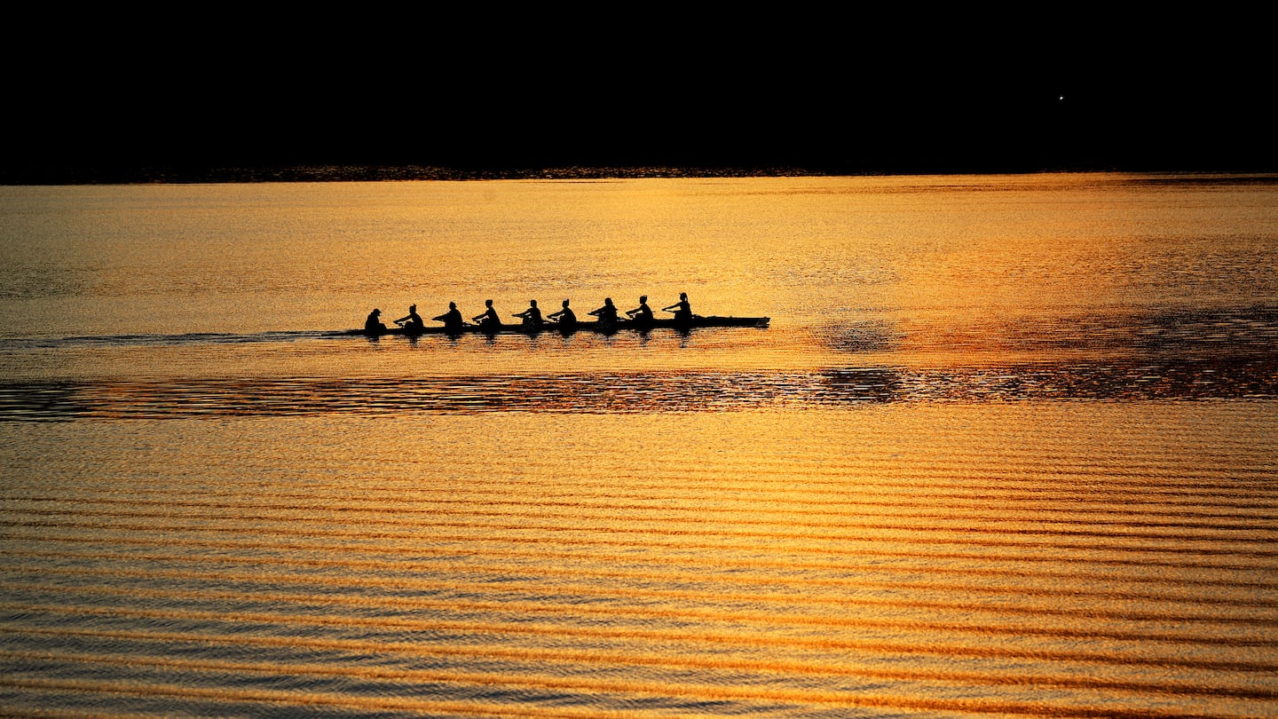 Rowers warm up for the Head of the Charles Regatta last year.