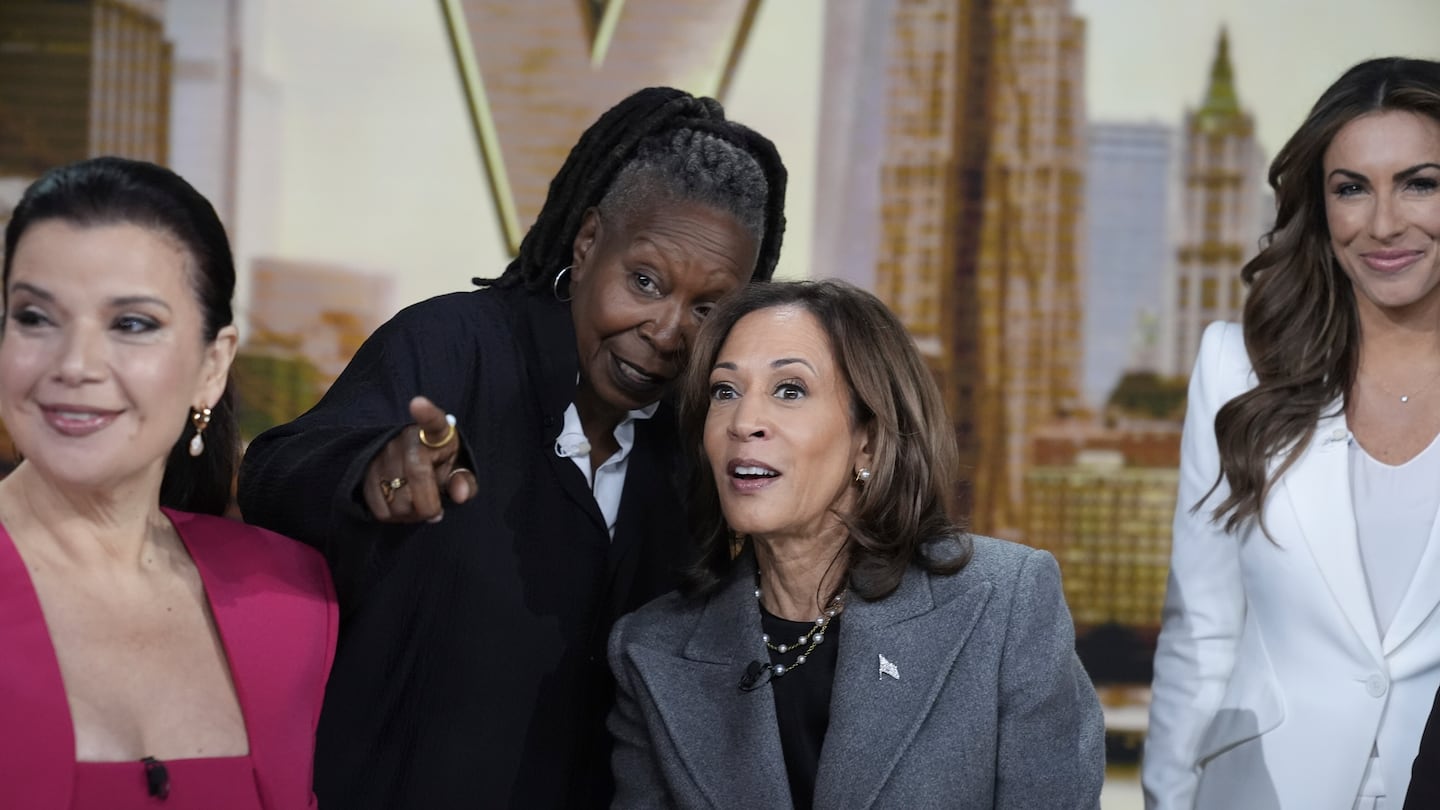 Vice President Kamala Harris chats with the hosts during a commercial break at The View, Tuesday, Oct. 8, 2024, in New York.