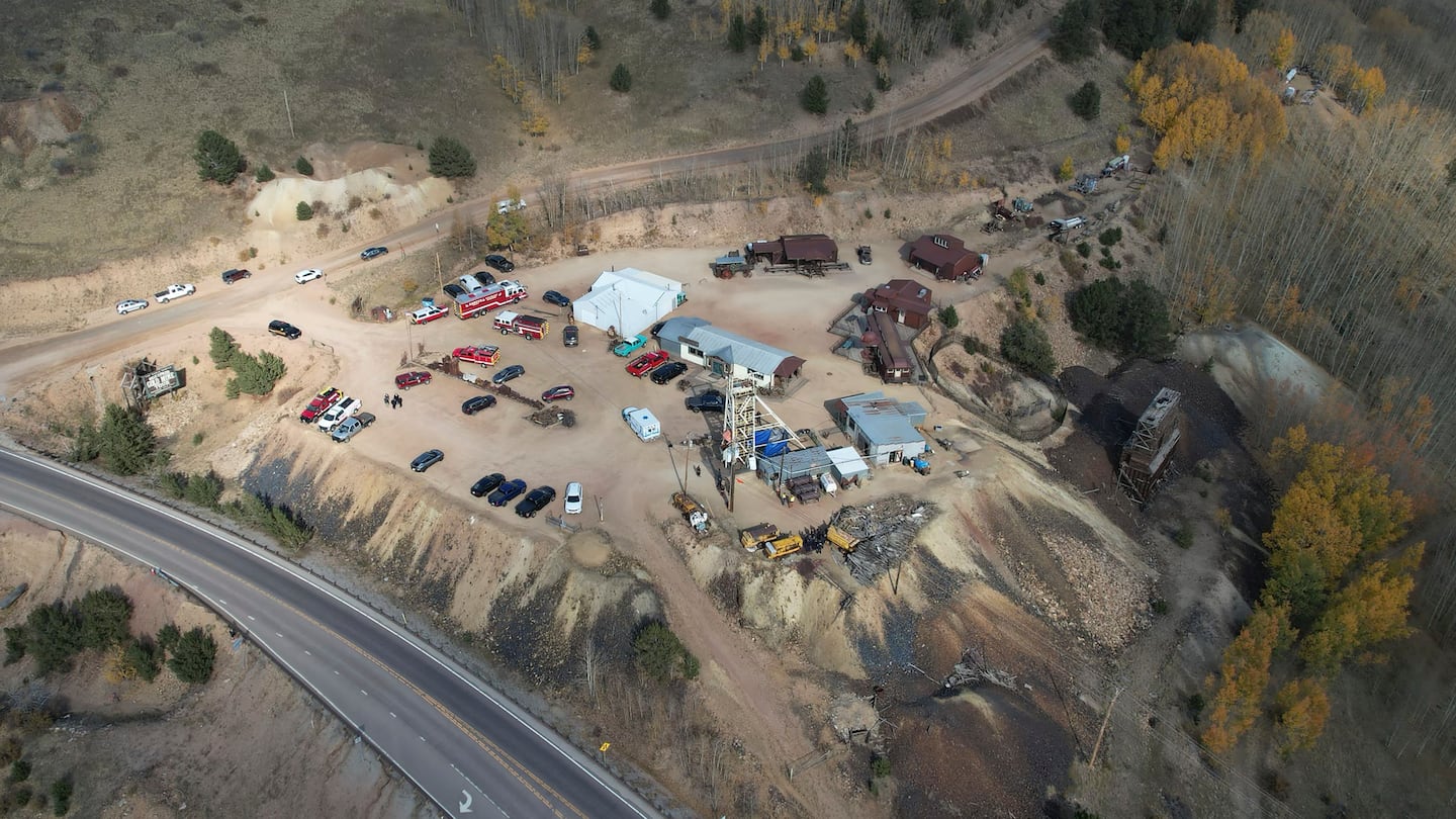 Emergency personnel stage outside the Mollie Kathleen Gold Mine in Cripple Creek, Colo., Oct. 10, after one person died in an equipment malfunction during a tour of the mine according to the Teller County Sheriff's Department.