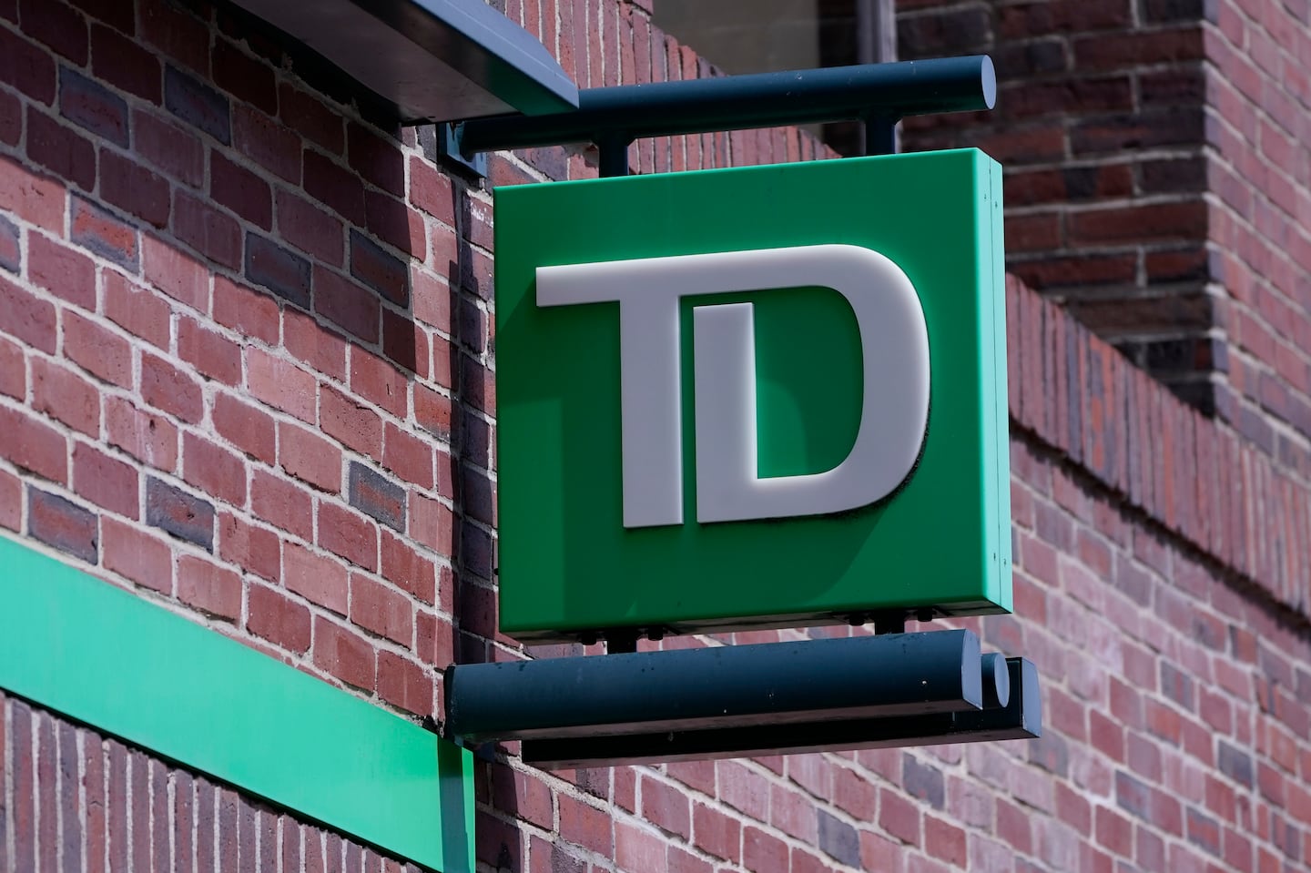 A sign hangs on TD Bank branch in Boston.