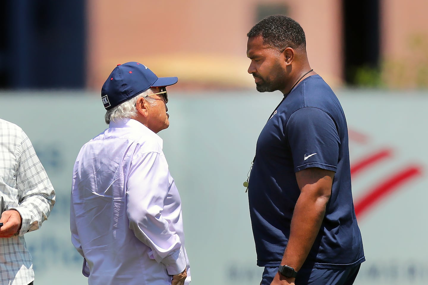 Patriots owner Robert Kraft and head coach Jerod Mayo chatted during a June practice.