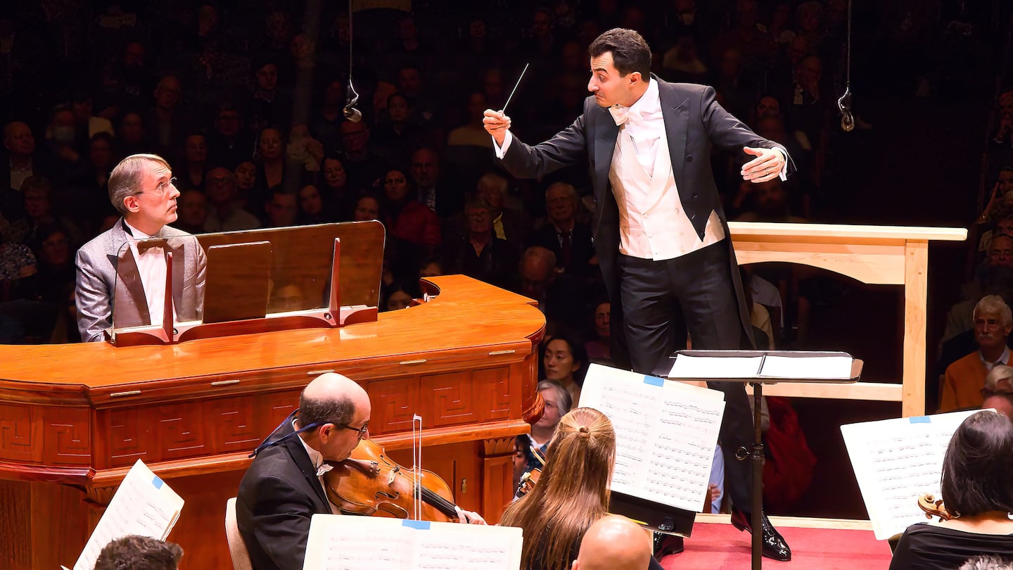 Organist Olivier Latry and Boston Symphony Orchestra assistant conductor Samy Rachid perform Michael Gandolfi's "Ascending Light" with the orchestra at Symphony Hall.