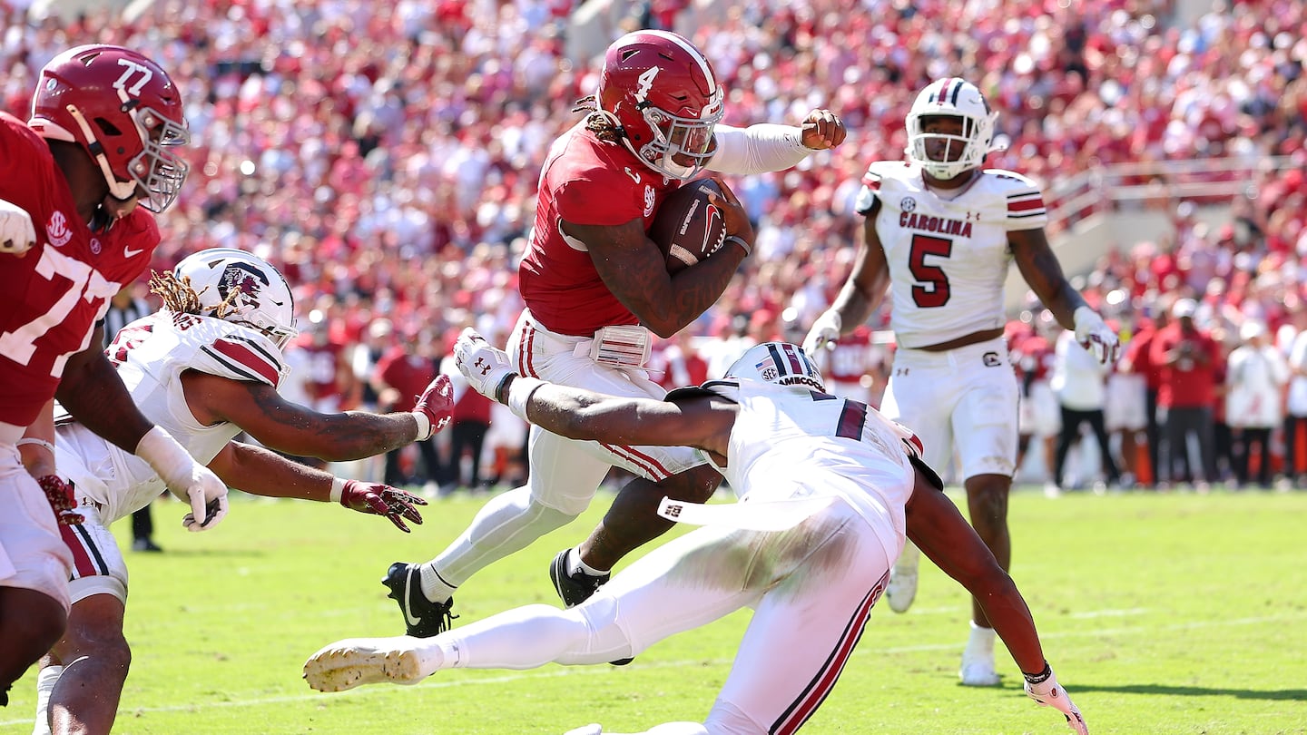 Alabama quarterback Jalen Milroe rushes for his second touchdown of the game in the fourth quarter of the Crimson Tide's 27-25 win over South Carolina.