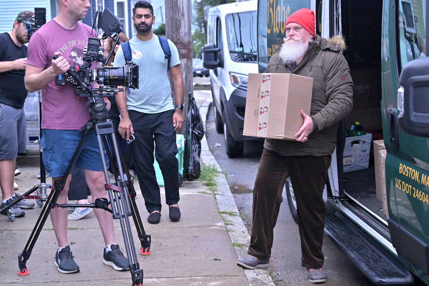 Ed Kearns (right) in his role as a Santa-like deliver man during the August filming of "A Letter's Journey." Boston based Digitas ad agency and video company ELEMENT Productions donated their services to create the advertising campaign.