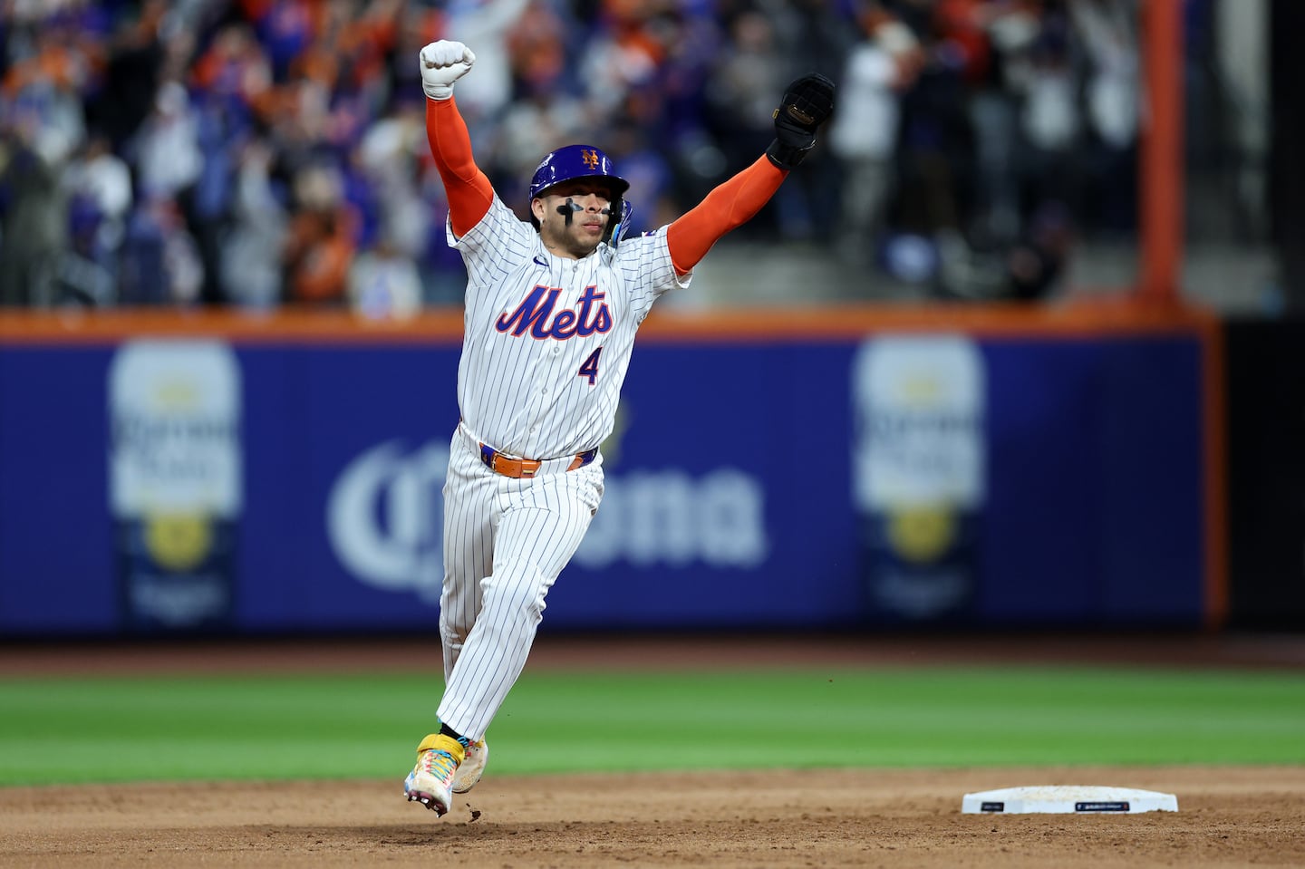 Francisco Alvarez rounds second base after Francisco Lindor crushed a sixth-inning grand slam when the Mets were down a run to help eliminate the Phillies in Game 4 of the National League Division Series.