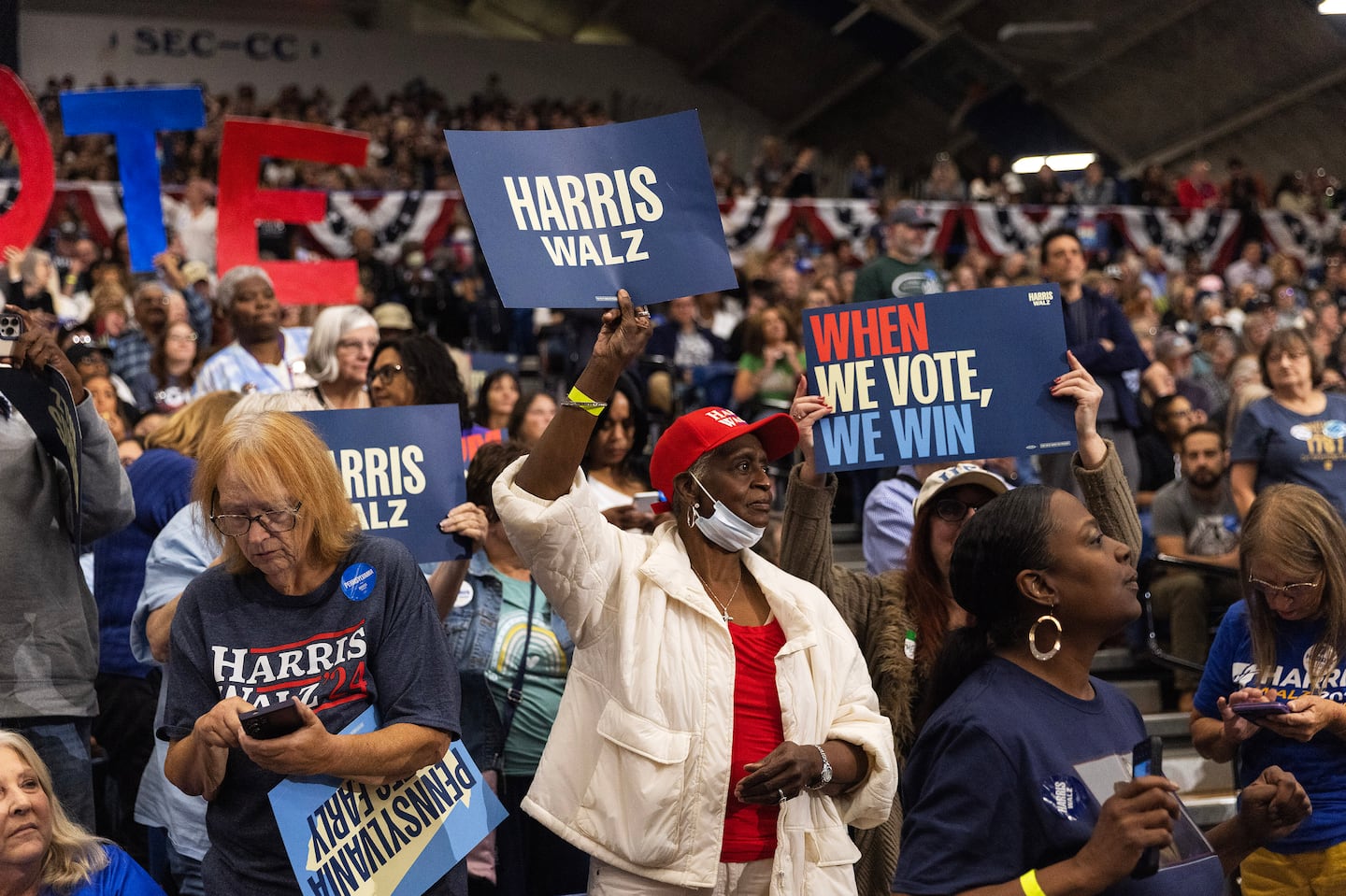 People waited for former president Barack Obama to arrive at a Harris-Walz campaign rally at the Fitzgerald Field House in Pittsburgh, on Oct. 10.