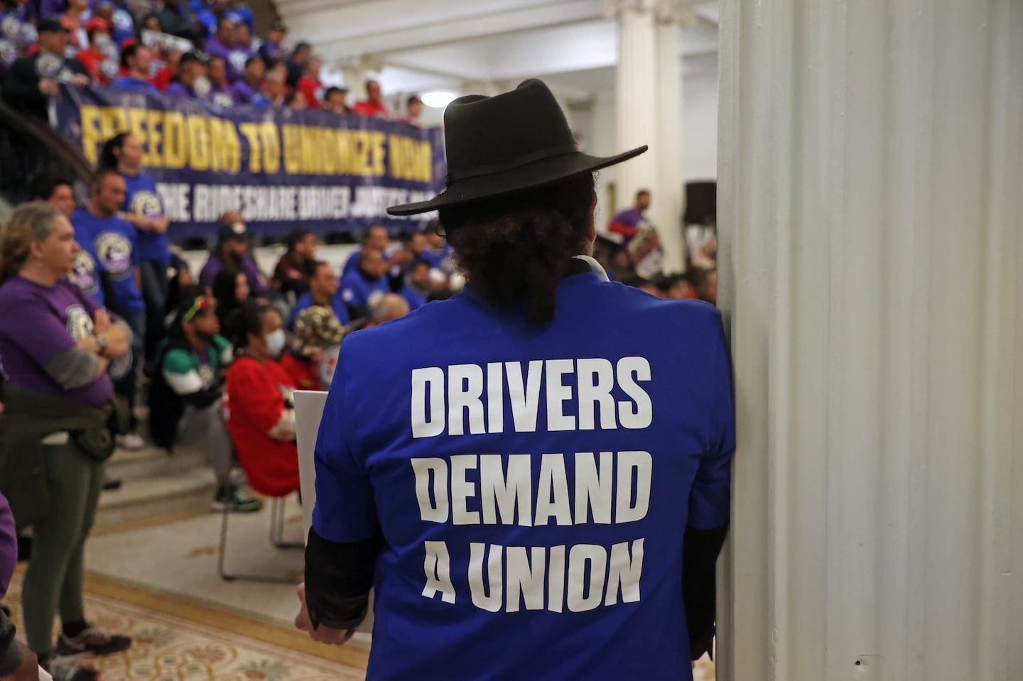 Uber and Lyft drivers rallied at the State House last year to support for their right to unionize.