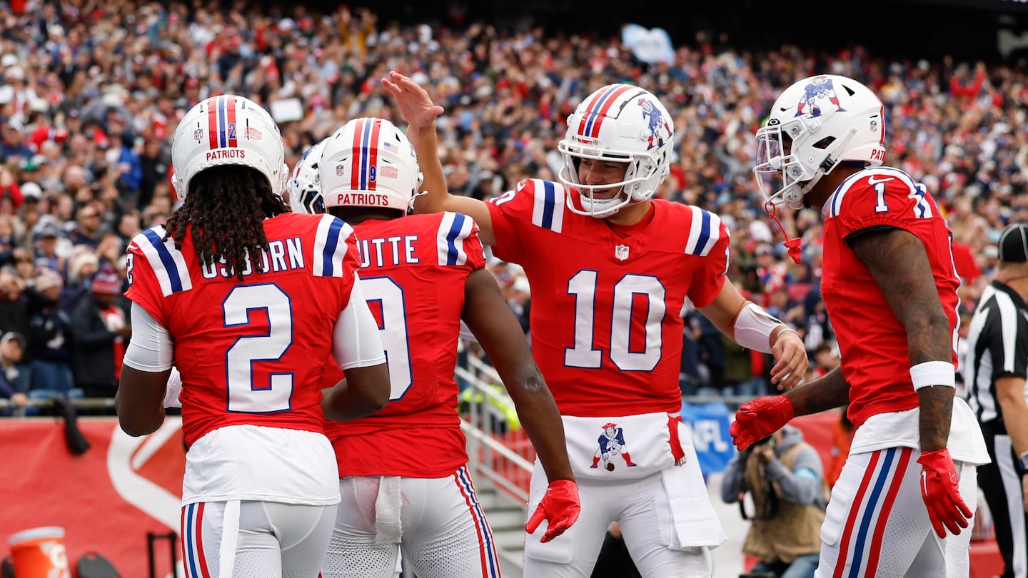 Drake Maye celebrated with Kayshon Boutte after the first of what Patriots fans hope are many NFL touchdown passes for the rookie quarterback.