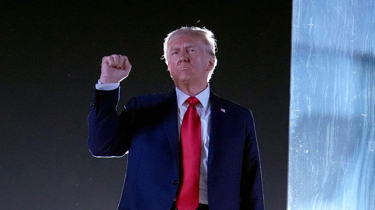 Republican presidential nominee former President Donald Trump gestures as he concludes speaking at a campaign event at the Butler Farm Show, Saturday, Oct. 5, 2024, in Butler, Pa.