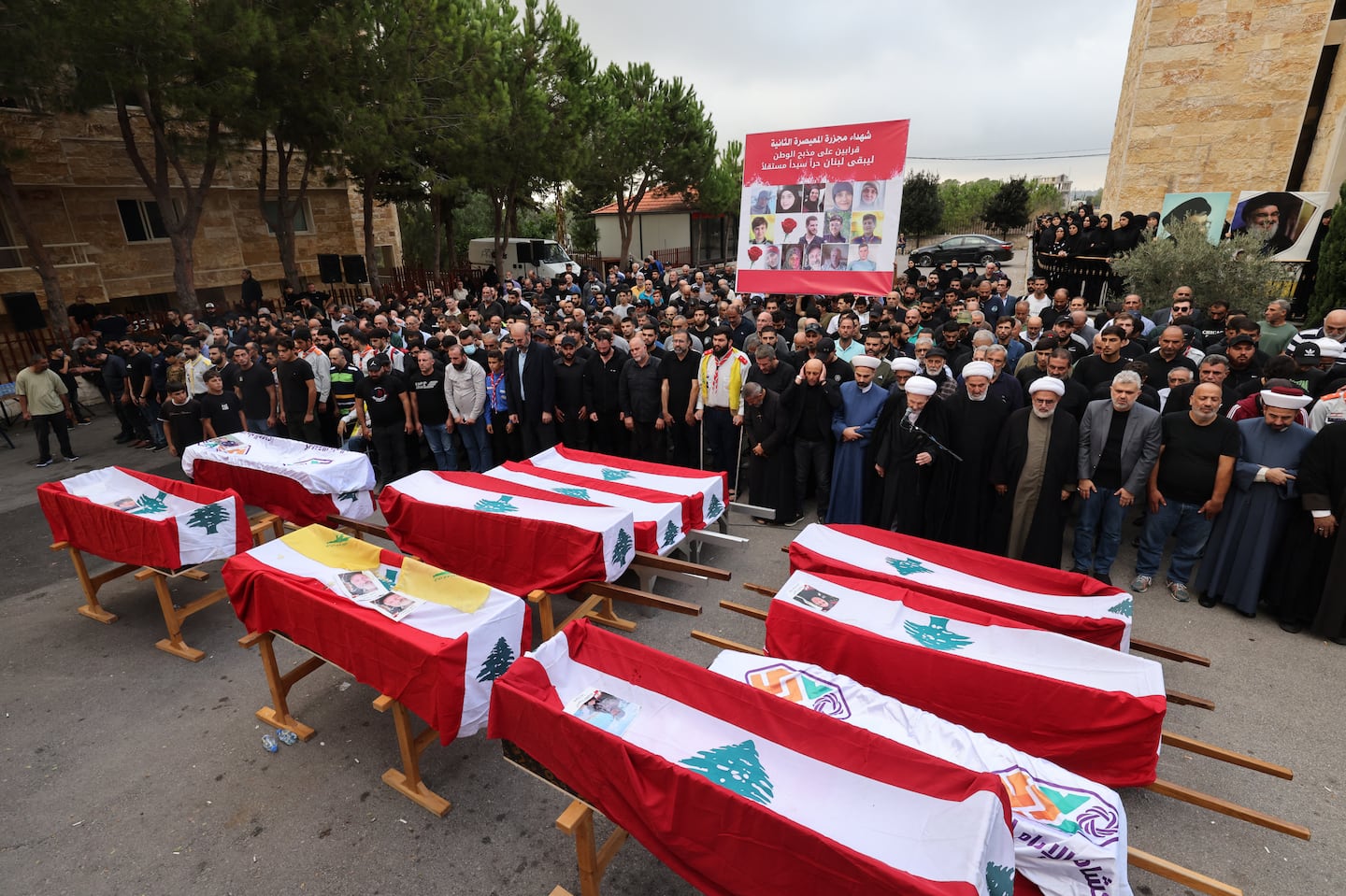 Mourners attend a funeral for the victims of an Israeli airstrike in the Mount Lebanon village of Maaysra, east of the coastal town of Byblos, on Oct. 14, 2024.