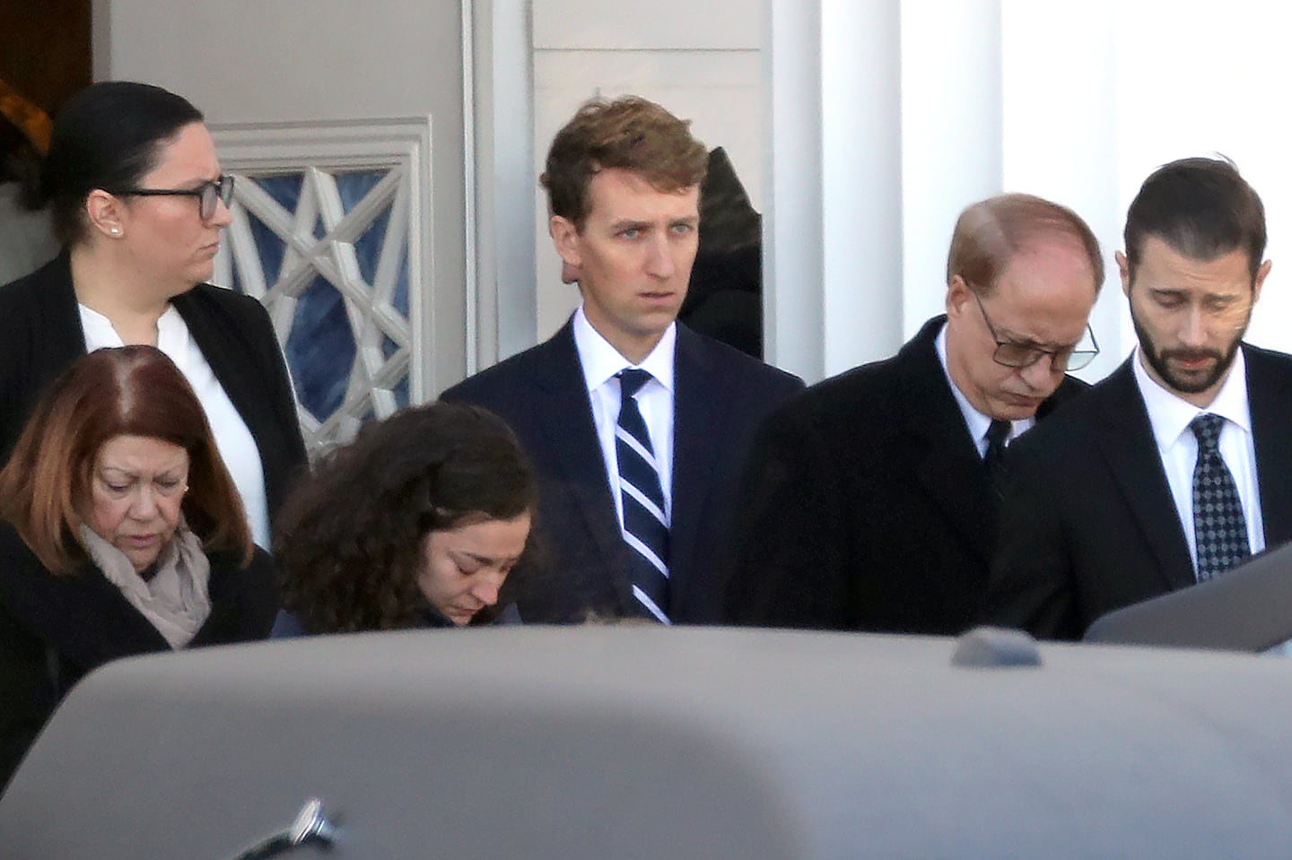 Patrick Clancy leaves funeral of his three children who were allegedly killed by his wife at their Duxbury home.