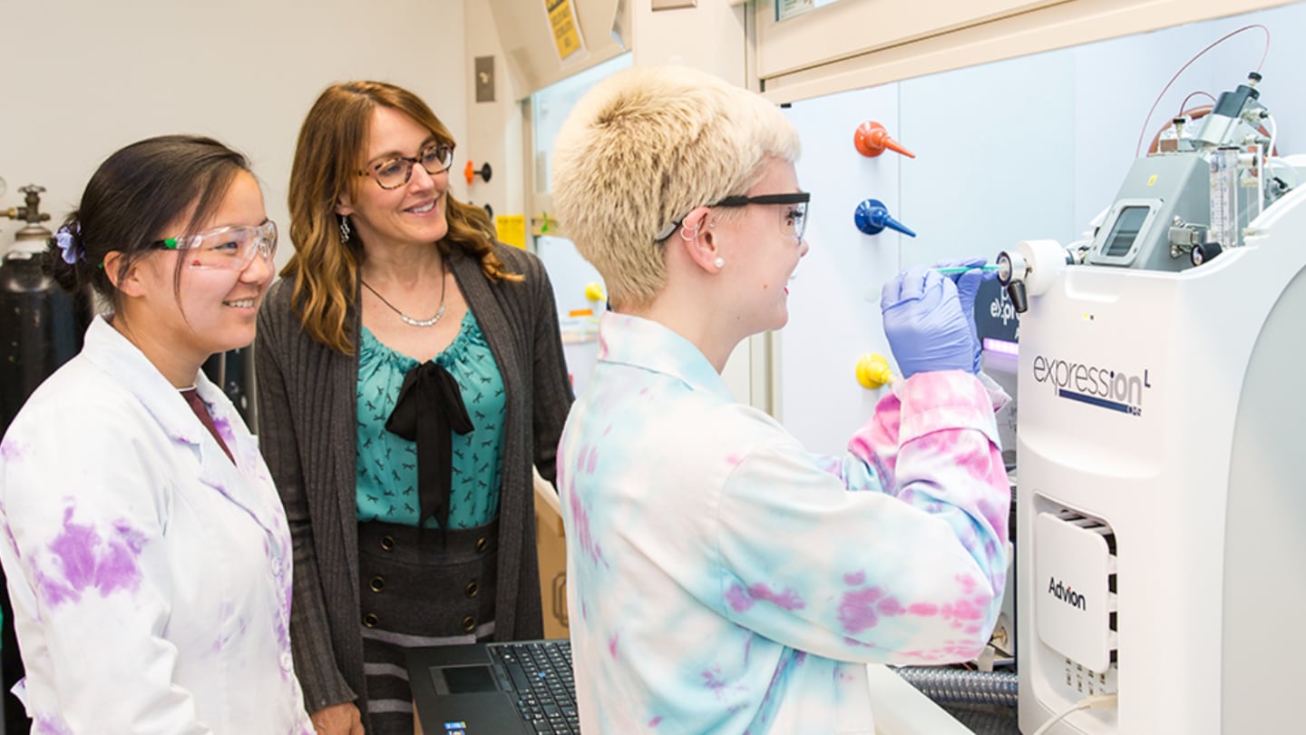 Dr. Susan Meschwitz (center), a chemistry professor at Salve Regina University in Newport, R.I., in her lab with two undergraduate students.